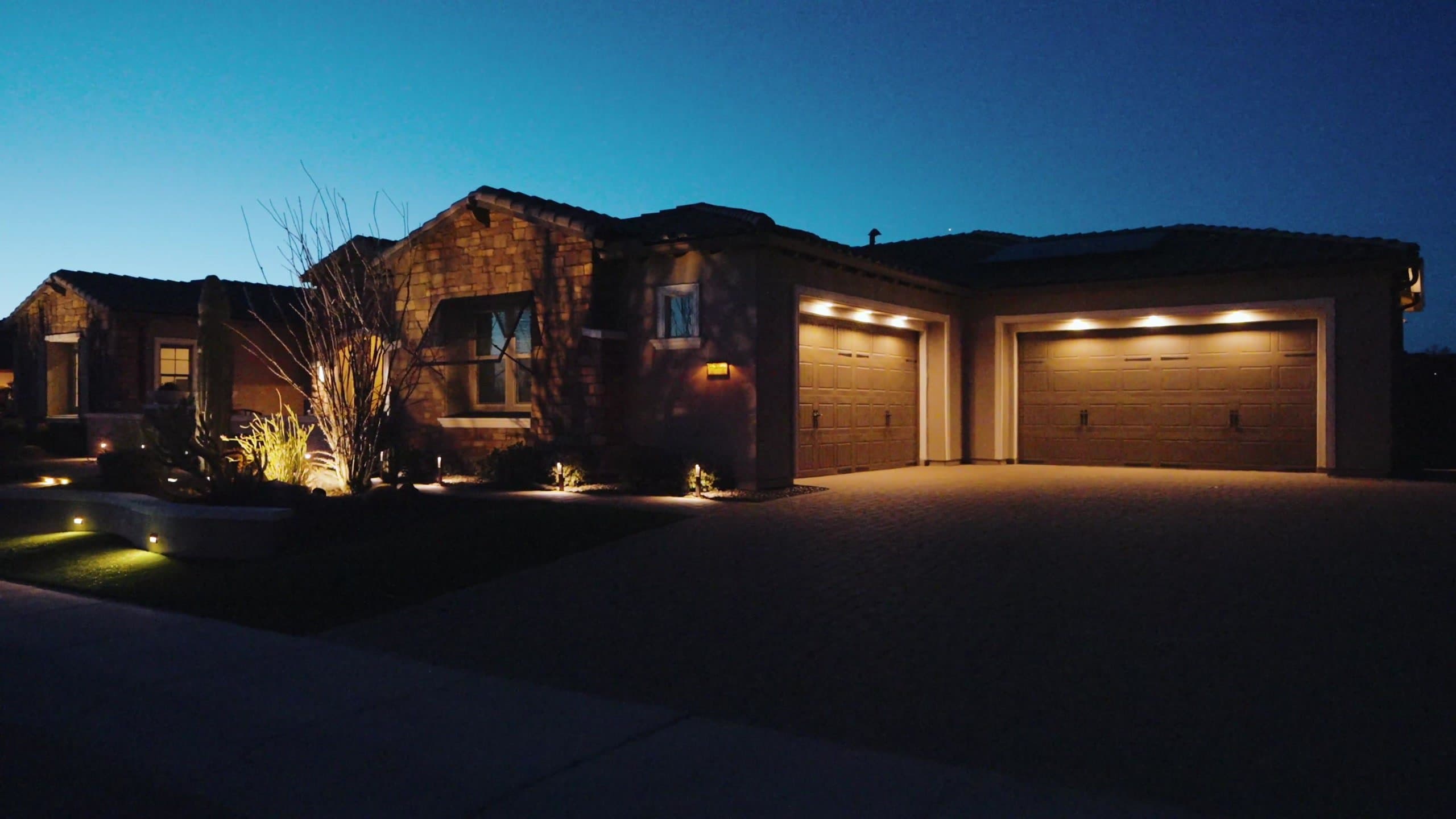 Desert-modern residence at dusk in the high desert