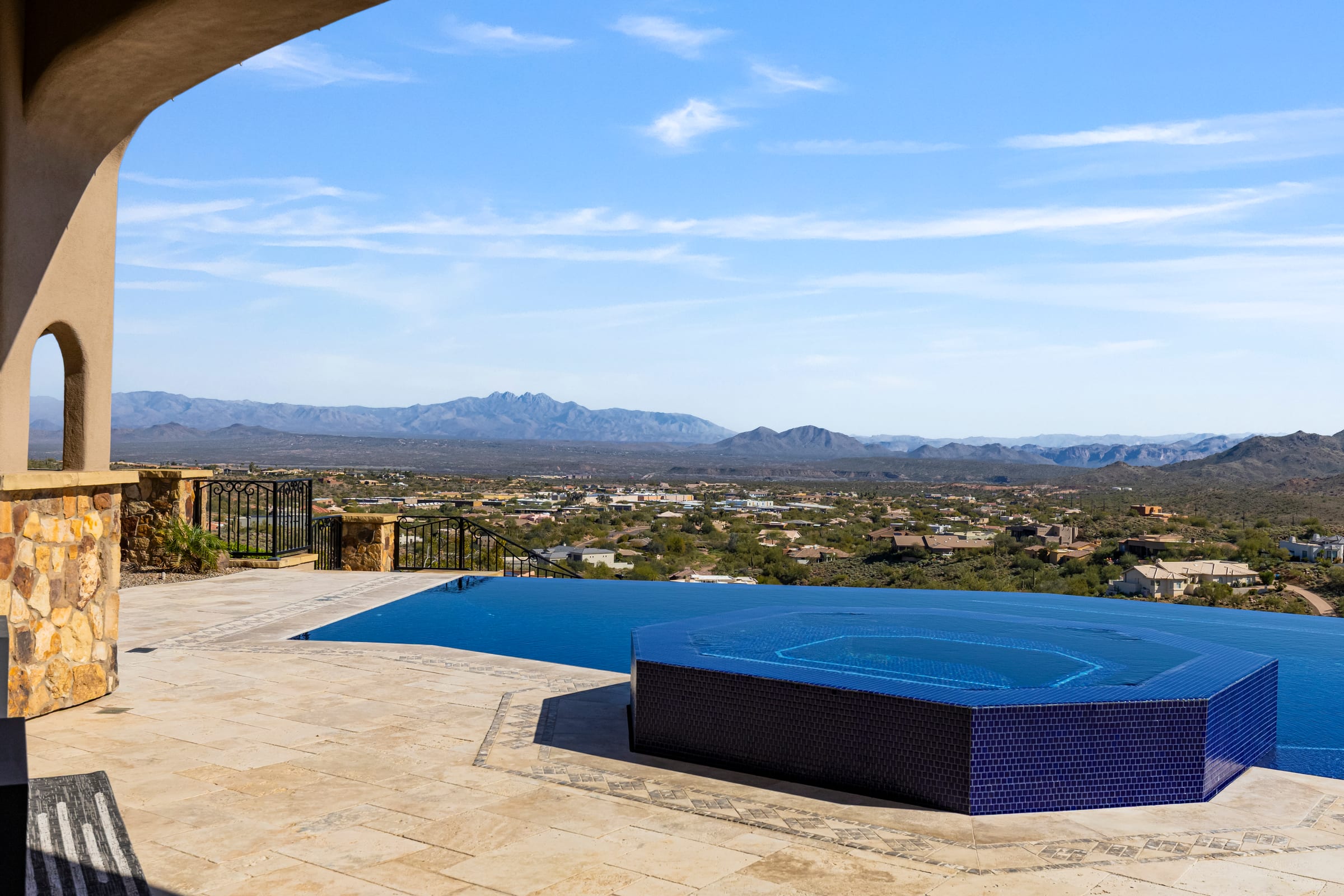 Infinity edge above the valley from a high-desert residence