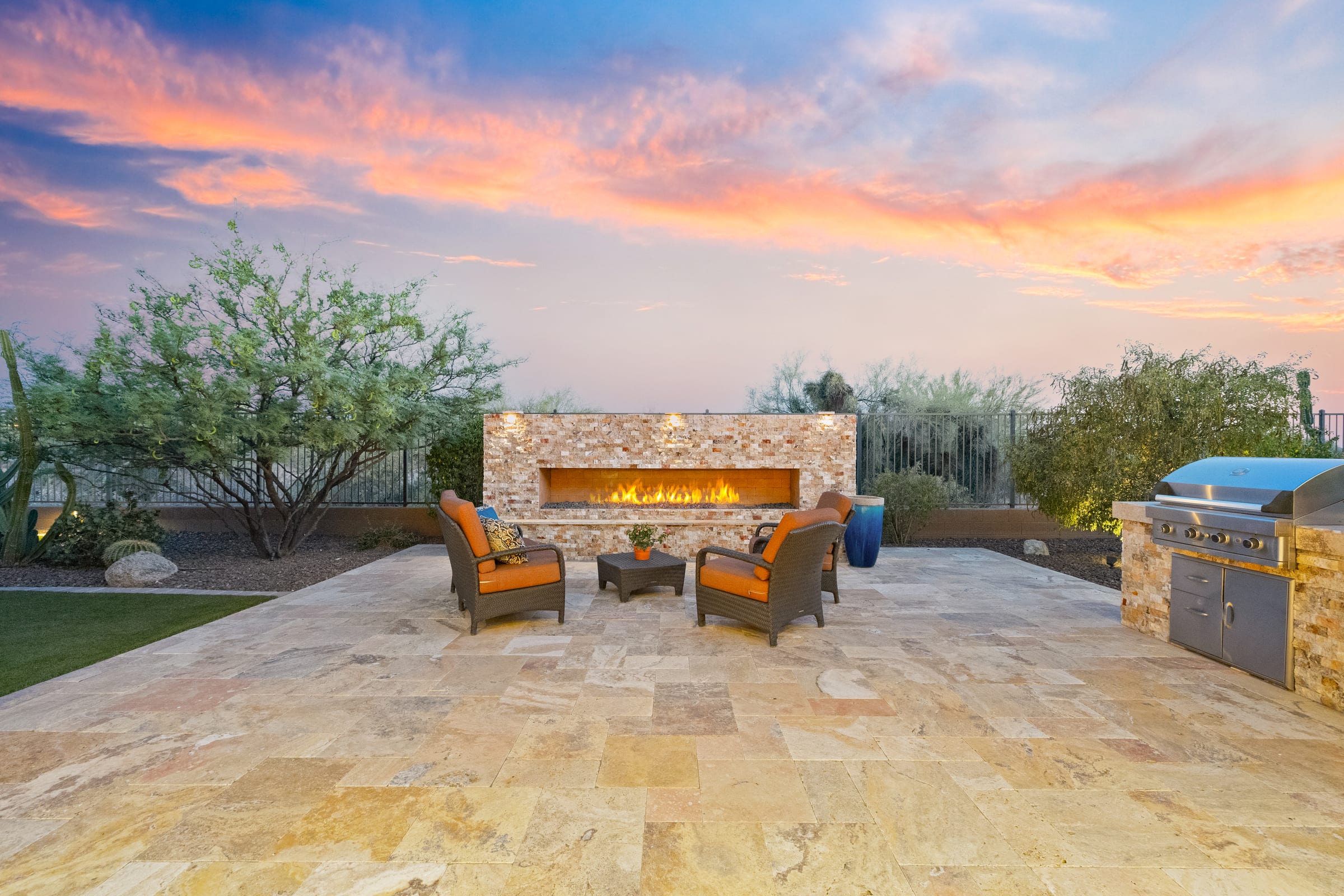 Patio fire feature against a Sonoran sunset